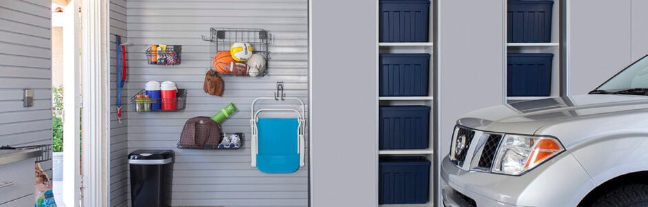 Organized Garage Storage with Cabinets and Slatwall System