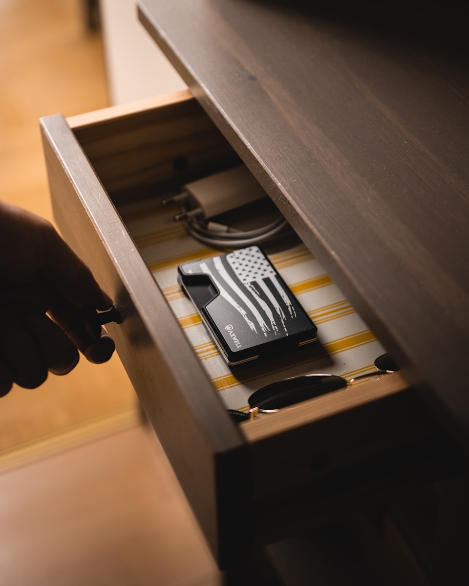organized entry table with storage drawer for keys , wallet, phone, to prevent visual clutter